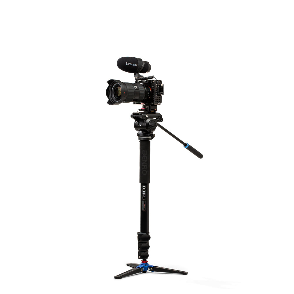 DSLR Camera on a monopod with a white background