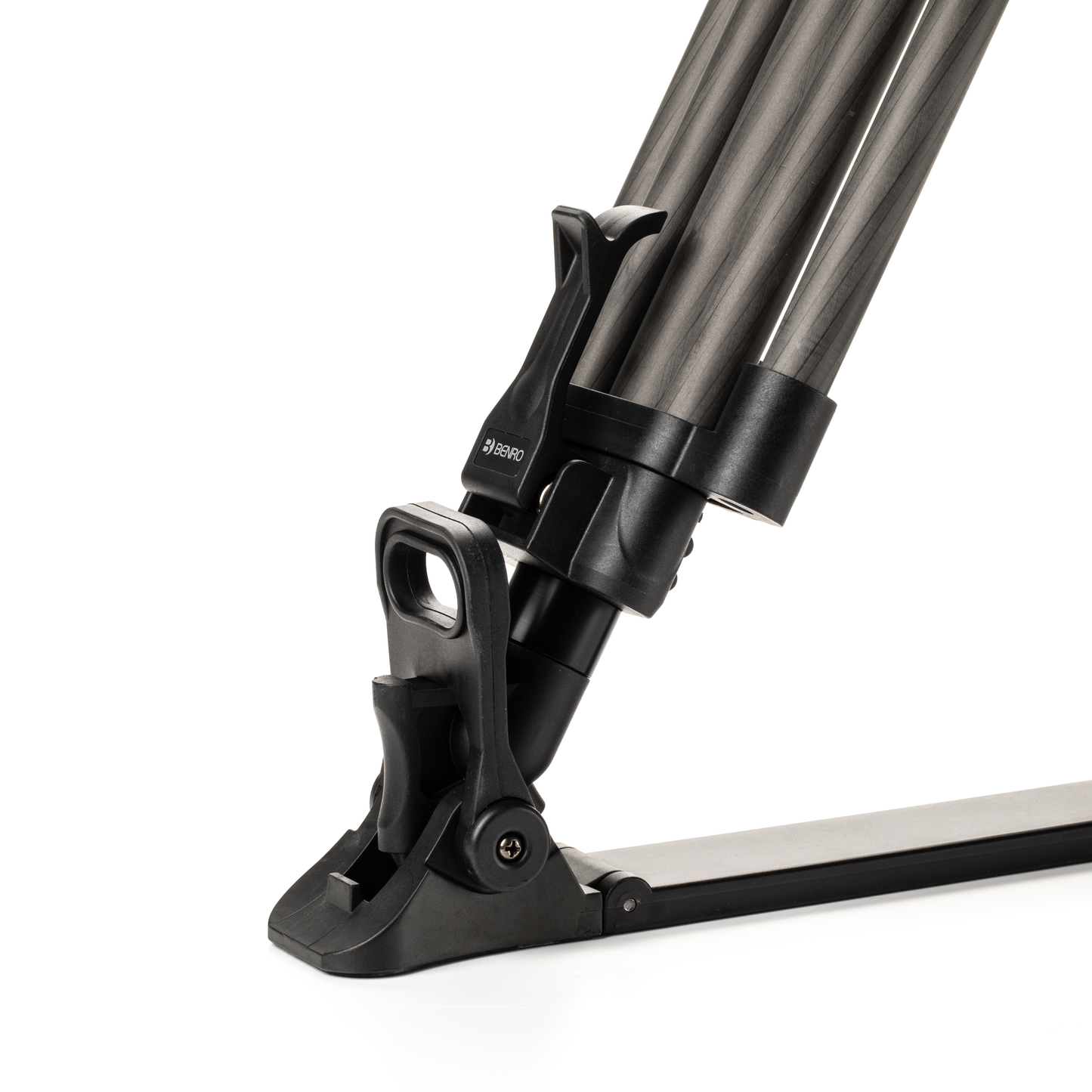 Hand adjusting the flip lock on a carbon fiber leg section of the BVX18 tripod