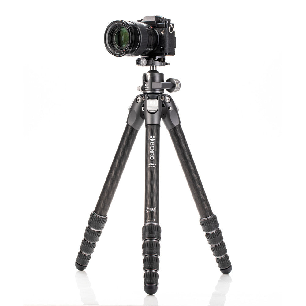 Lightweight Benro Tortoise carbon fiber tripod with ergonomic twist locks, 61-inch max height, and included tripod bag.