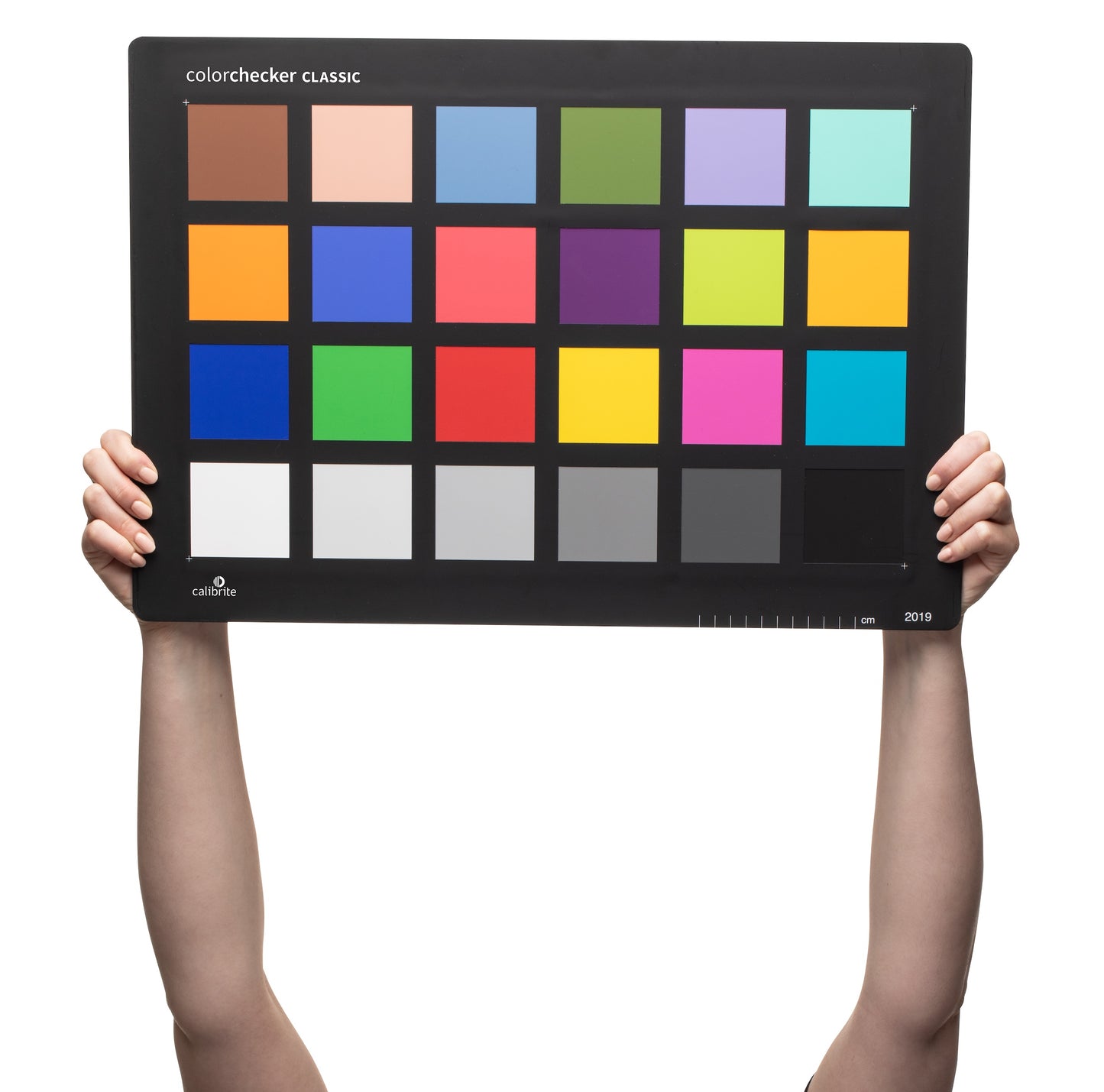 ColorChecker calibration chart next to a camera for precise DNG and ICC profile creation