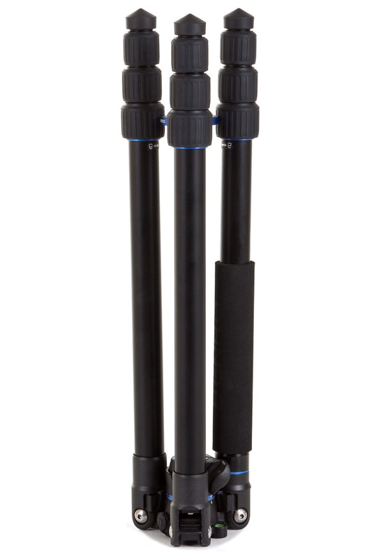Compact Benro FGP28A tripod with reverse-folded legs for travel and storage.