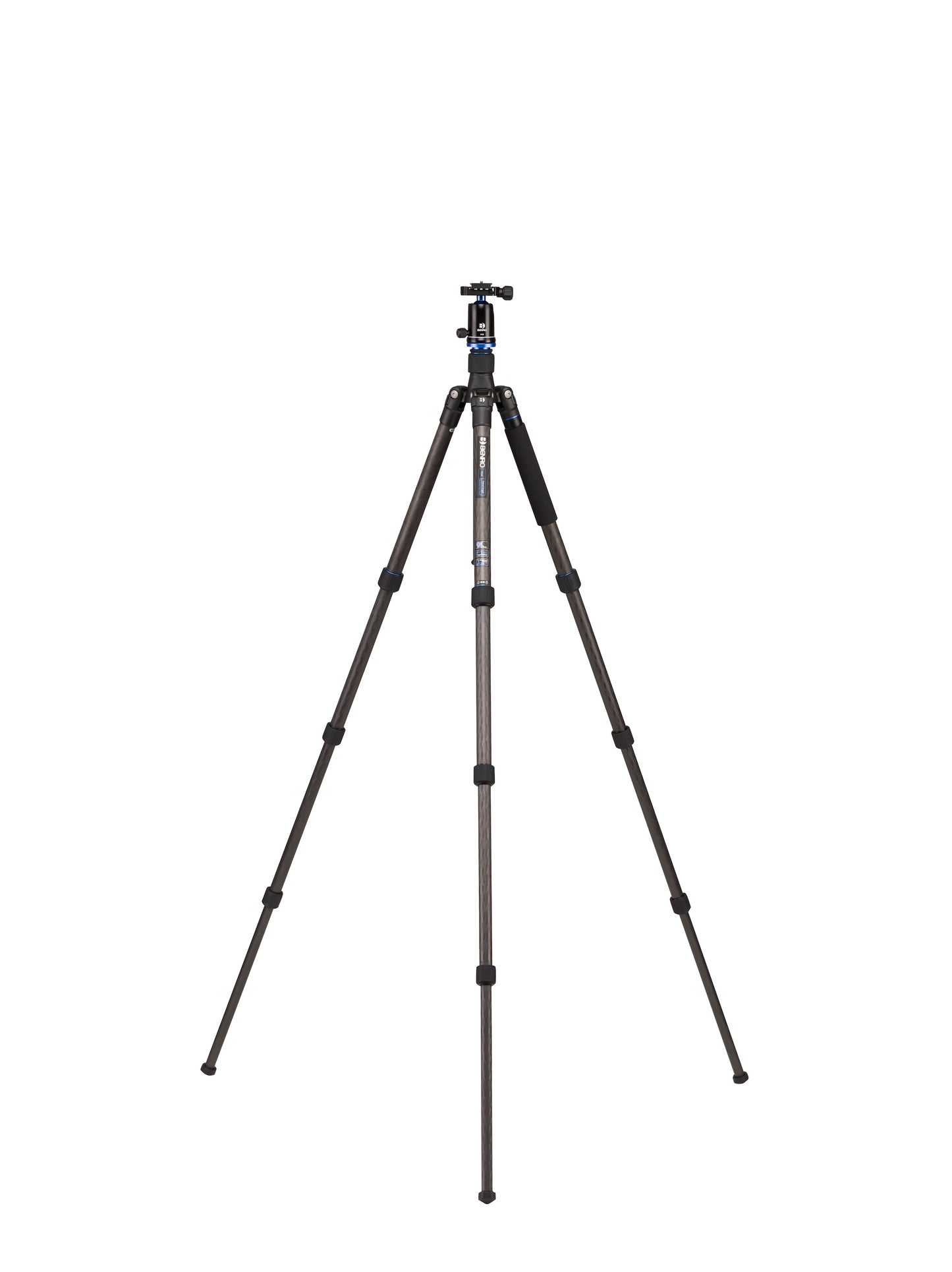 The tripod extended to its full height next to a person for scale.