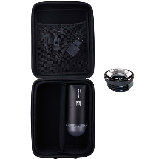 Photographer adjusting Elinchrom OCF modifier on the THREE flash