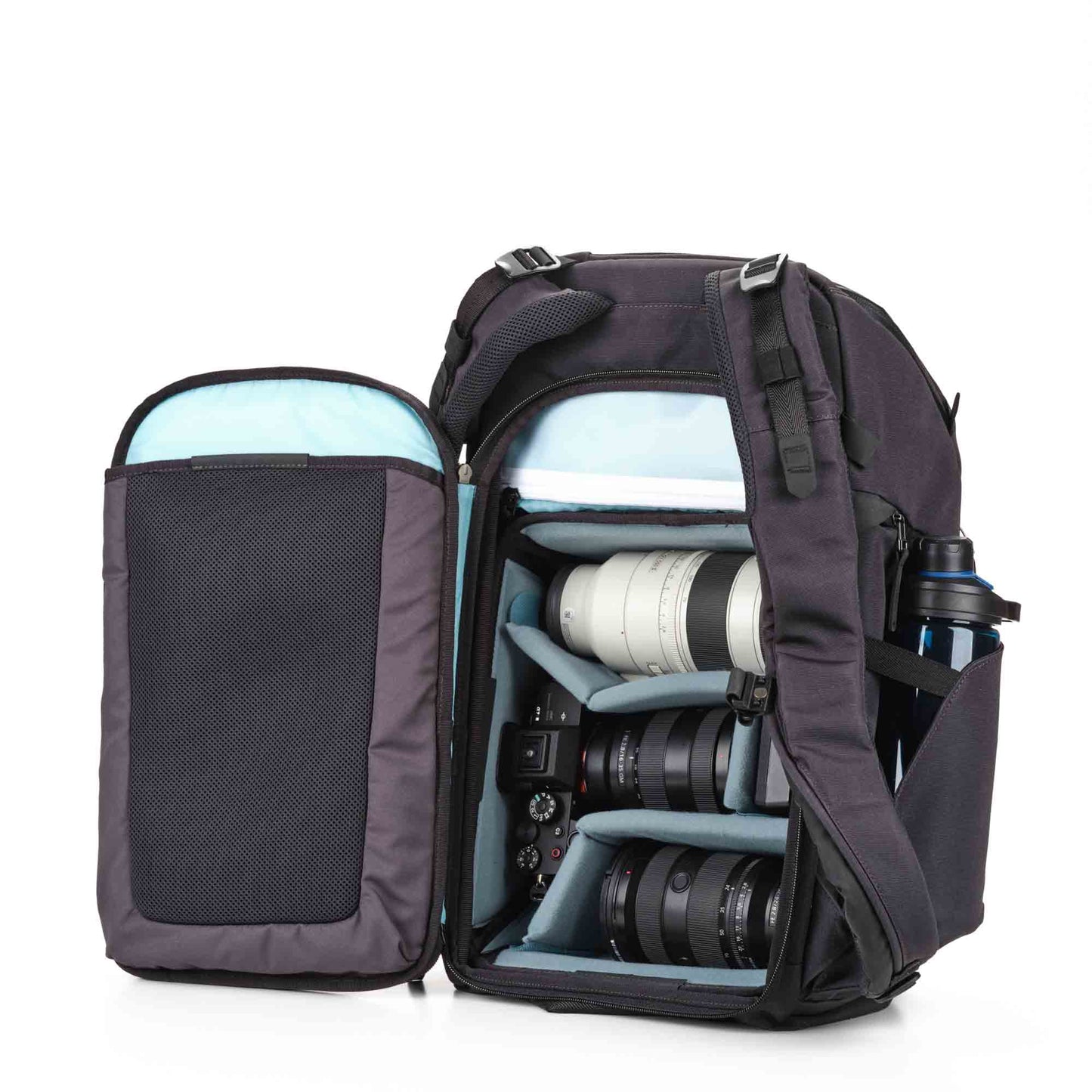 Photographer wearing Urban Explore backpack with mounted Capture Clip