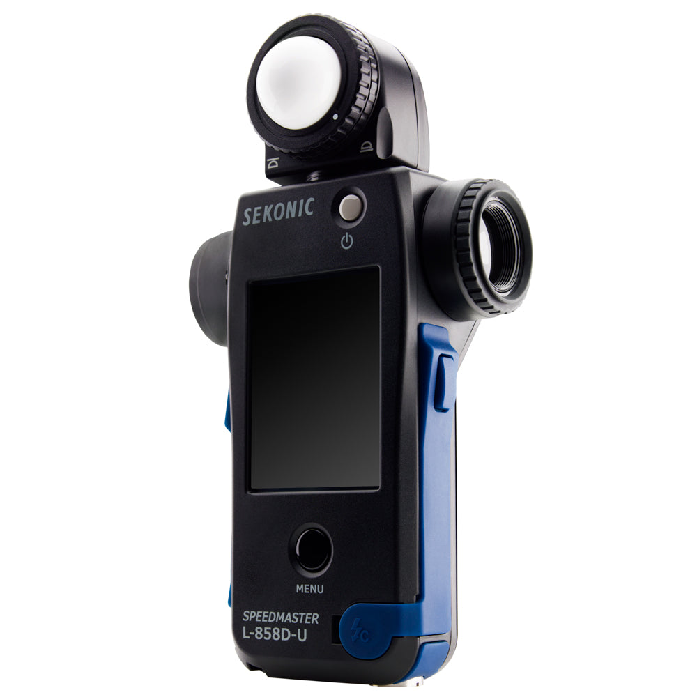 Professional photographer using Sekonic light meter on set