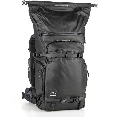 Side view of the Shimoda Action X30 backpack showing sleek design and durable materials.