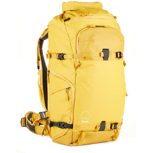 TPU Compression Straps Holding Skis – The Action X50 V2 Backpack with reinforced TPU straps securing bulky gear such as skis to the side, perfect for winter sports enthusiasts.