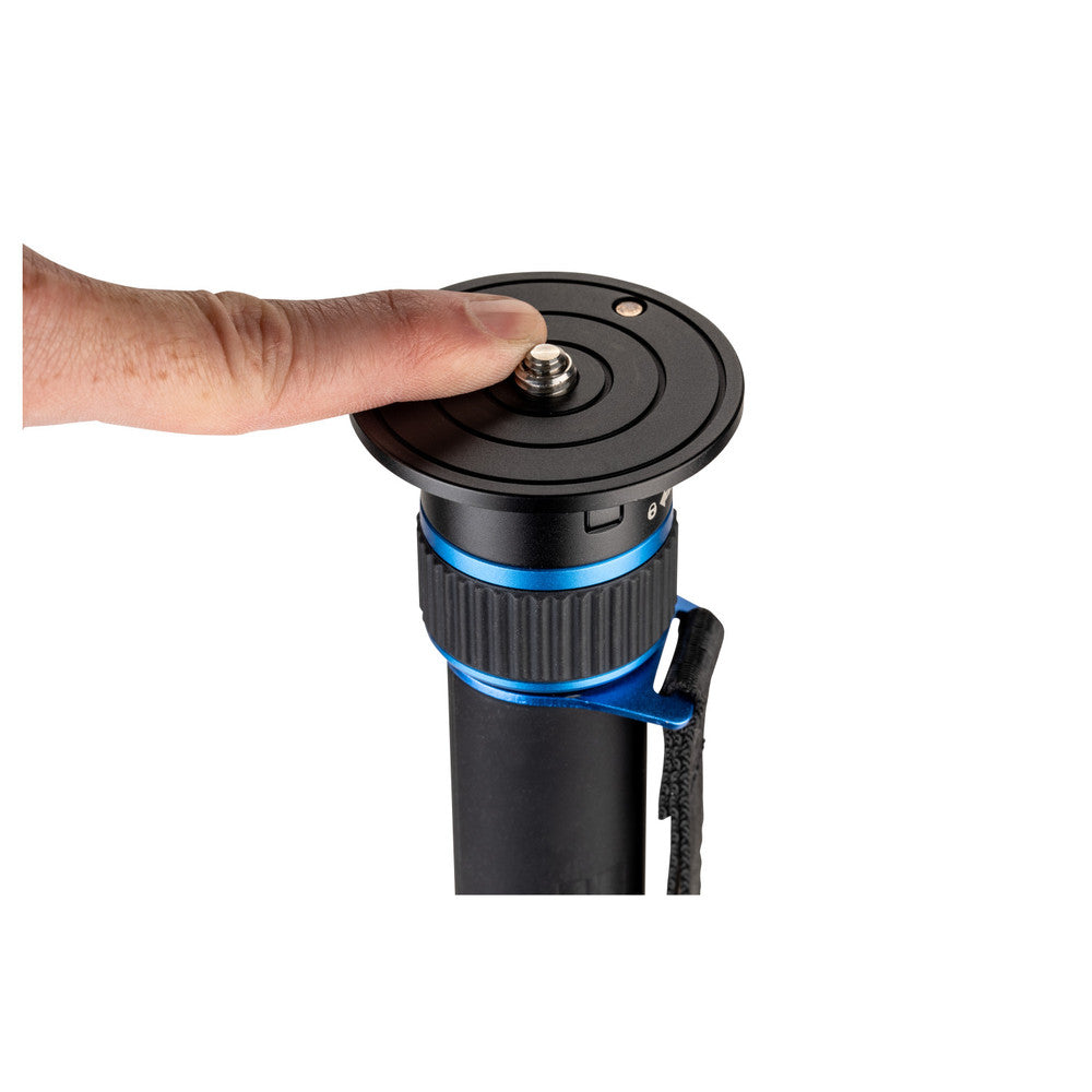 Videographer using Benro Connect monopod in vertical 90° notch position