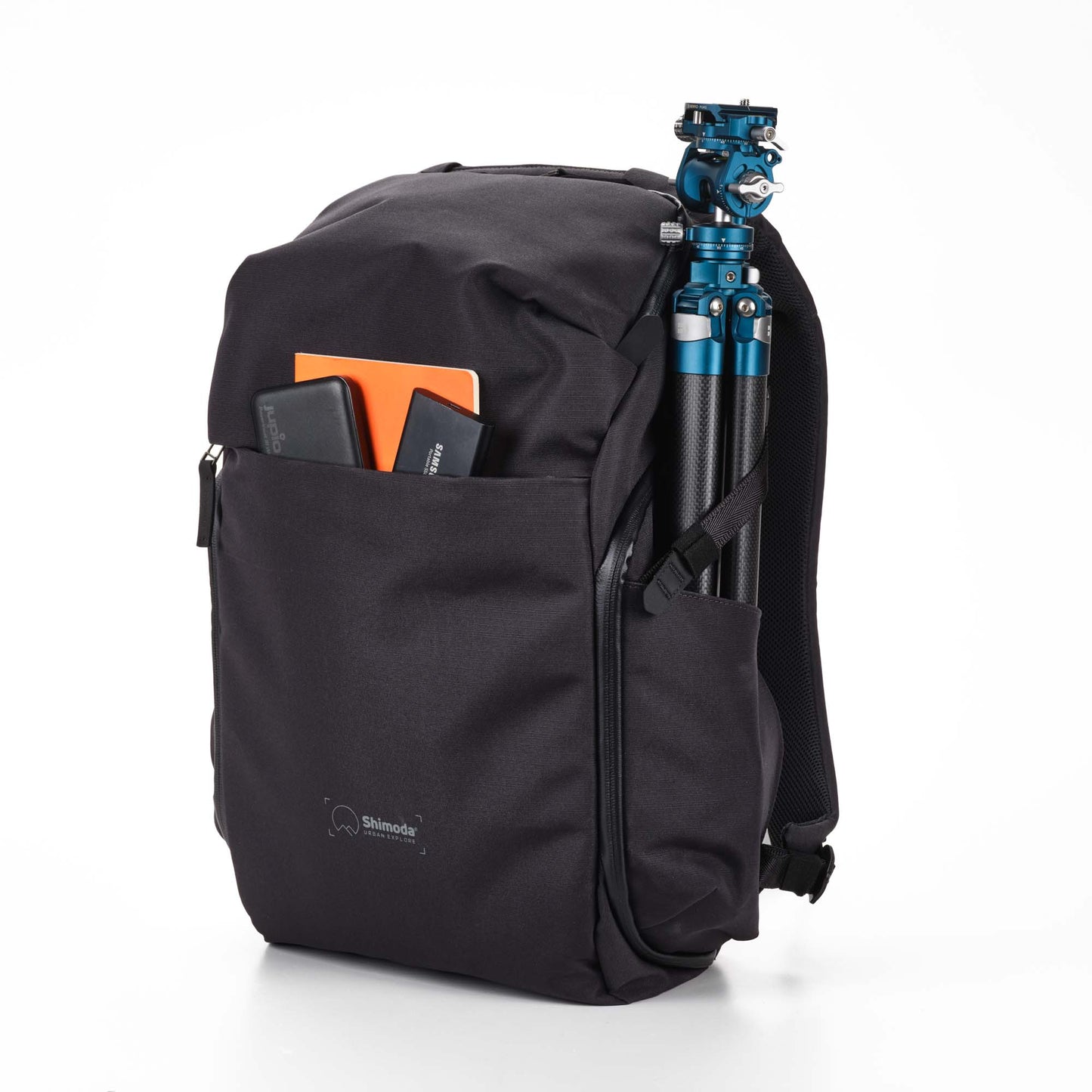 Travel-ready camera backpack with tripod side pocket and luggage pass-through