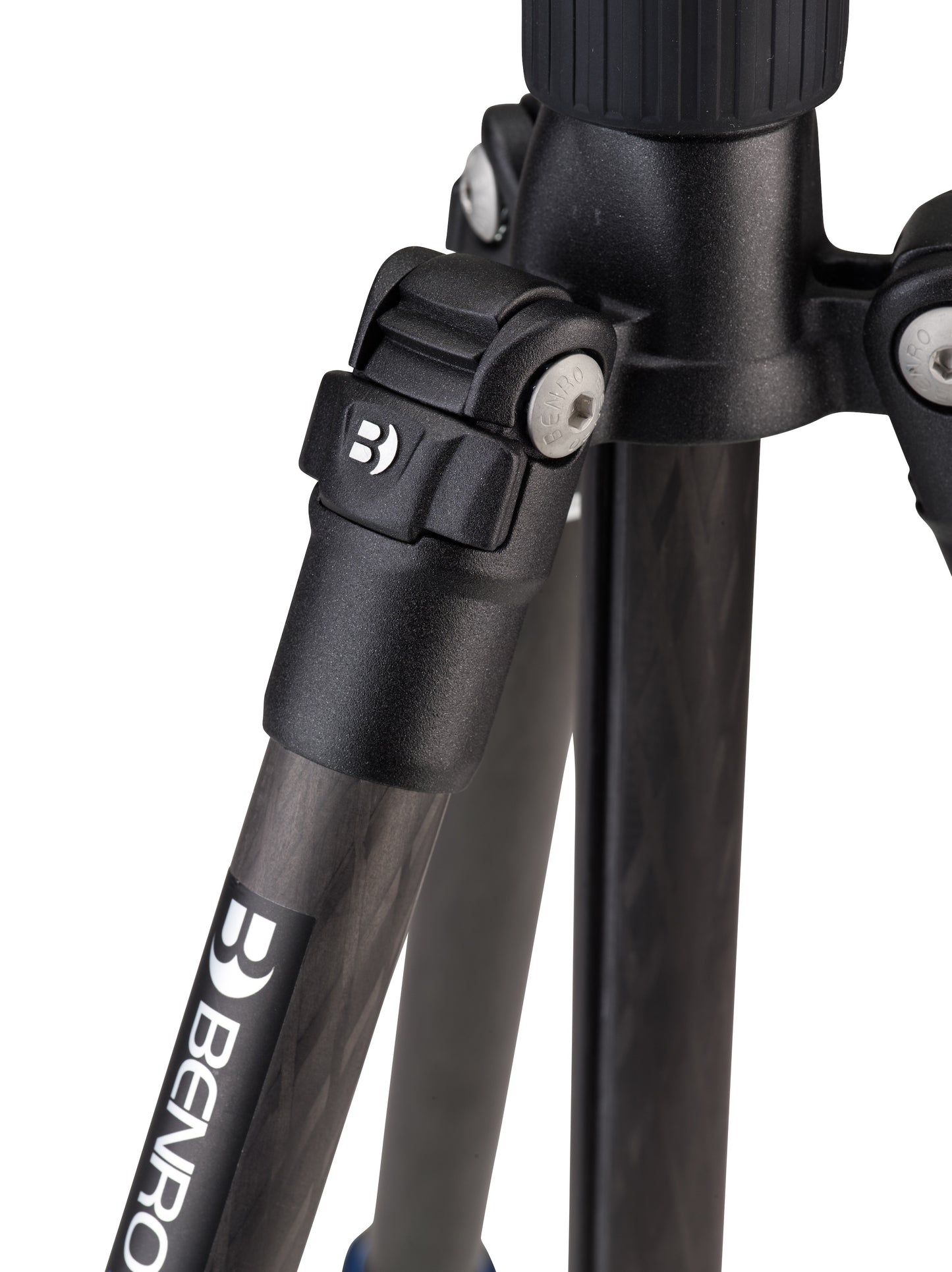 The compact tripod attached to the side of a hiking backpack.