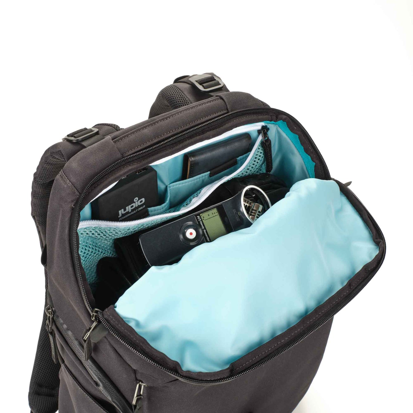 Water-resistant recycled Cordura fabric close-up with brand logo