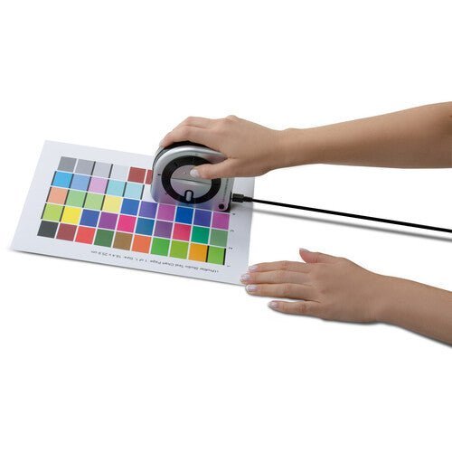 ColorChecker Studio ensuring consistent color across multiple computer monitors simultaneously.