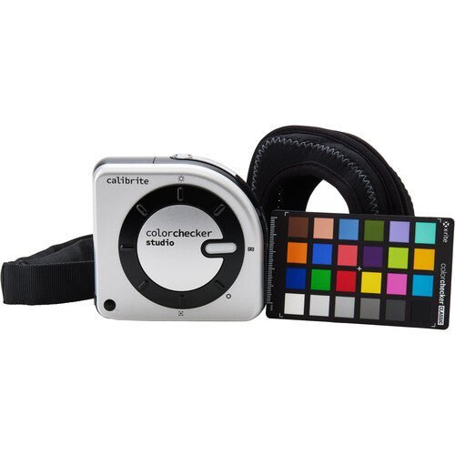 The all-in-one ColorChecker Studio kit open, showing the ccColorimeter, cables, and protective case.
