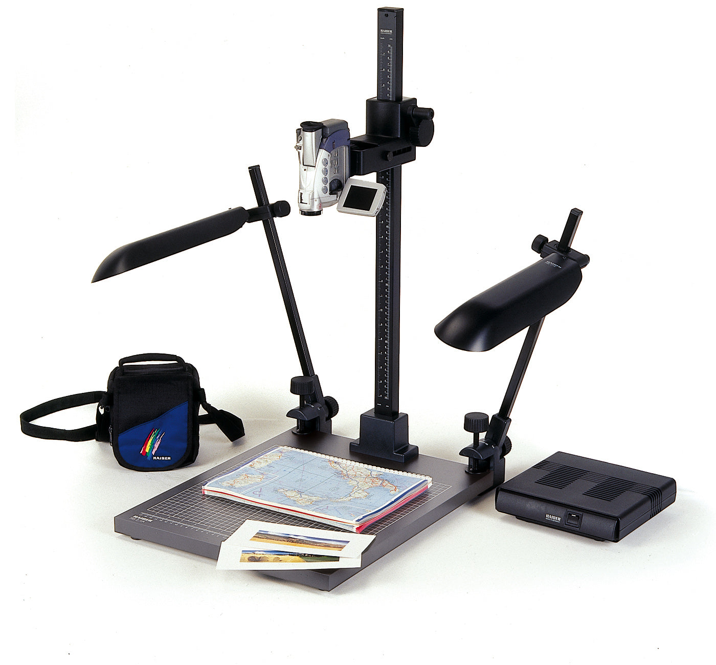 Close-up of Kaiser RS2 XA baseboard showing the printed inch and centimeter scale with fine grid for precise alignment.