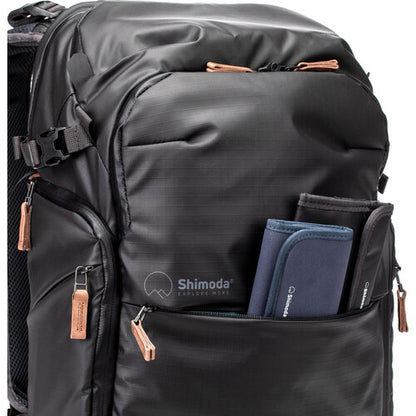 Fully opened Shimoda Explore V2 25 backpack showing the organized interior and modular layout.