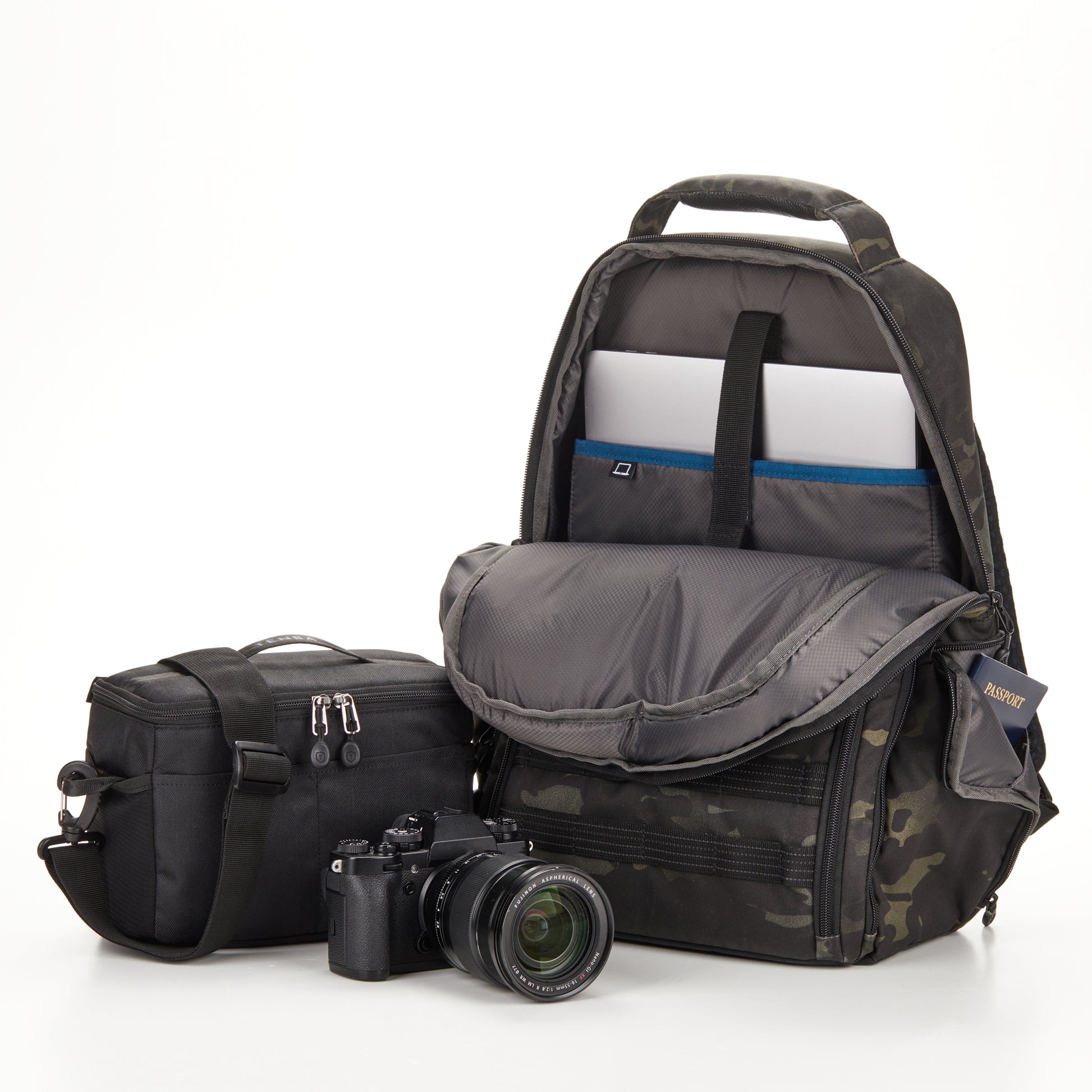 Back panel showing Tenba Airflow harness and Pivot-Fit shoulder straps for ergonomic carrying.