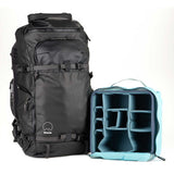 Side view of the Shimoda Designs Action X50 V2 Starter Kit backpack, showcasing adjustable shoulder straps and multiple pockets