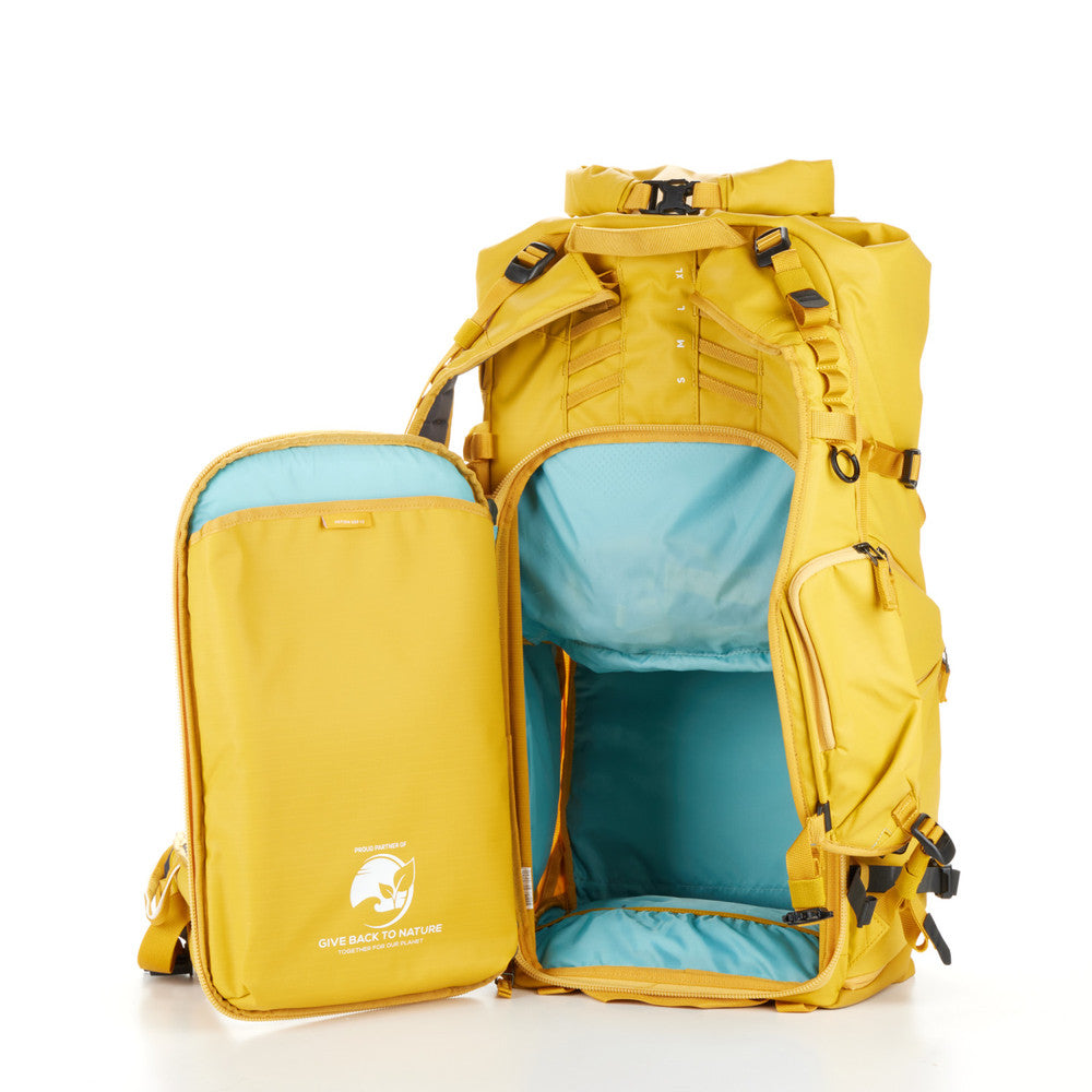 Side view of the Action X50 Backpack, highlighting its roll-top expandable design.
