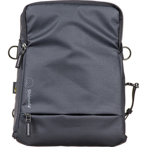 Shimoda Designs Top Loader camera bag with expandable base extended for telephoto lenses.