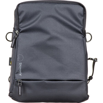 Shimoda Designs Top Loader camera bag with expandable base extended for telephoto lenses.