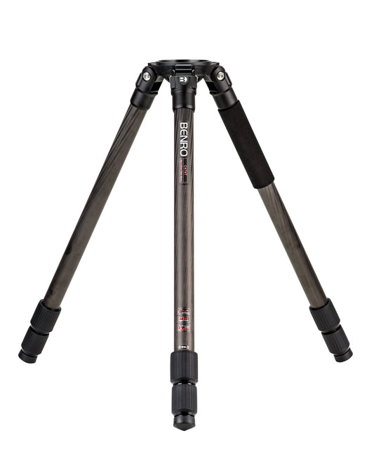 The Benro C474T carbon fiber video tripod on a rocky outdoor location.
