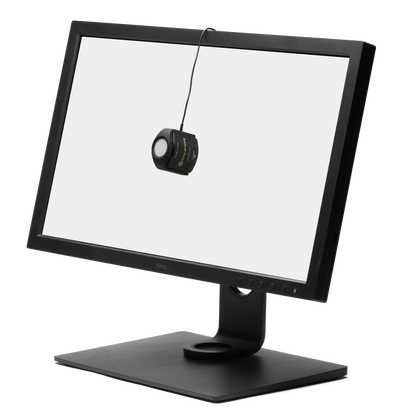 Calibrite Display Plus HL measuring uniformity on a large desktop display.
