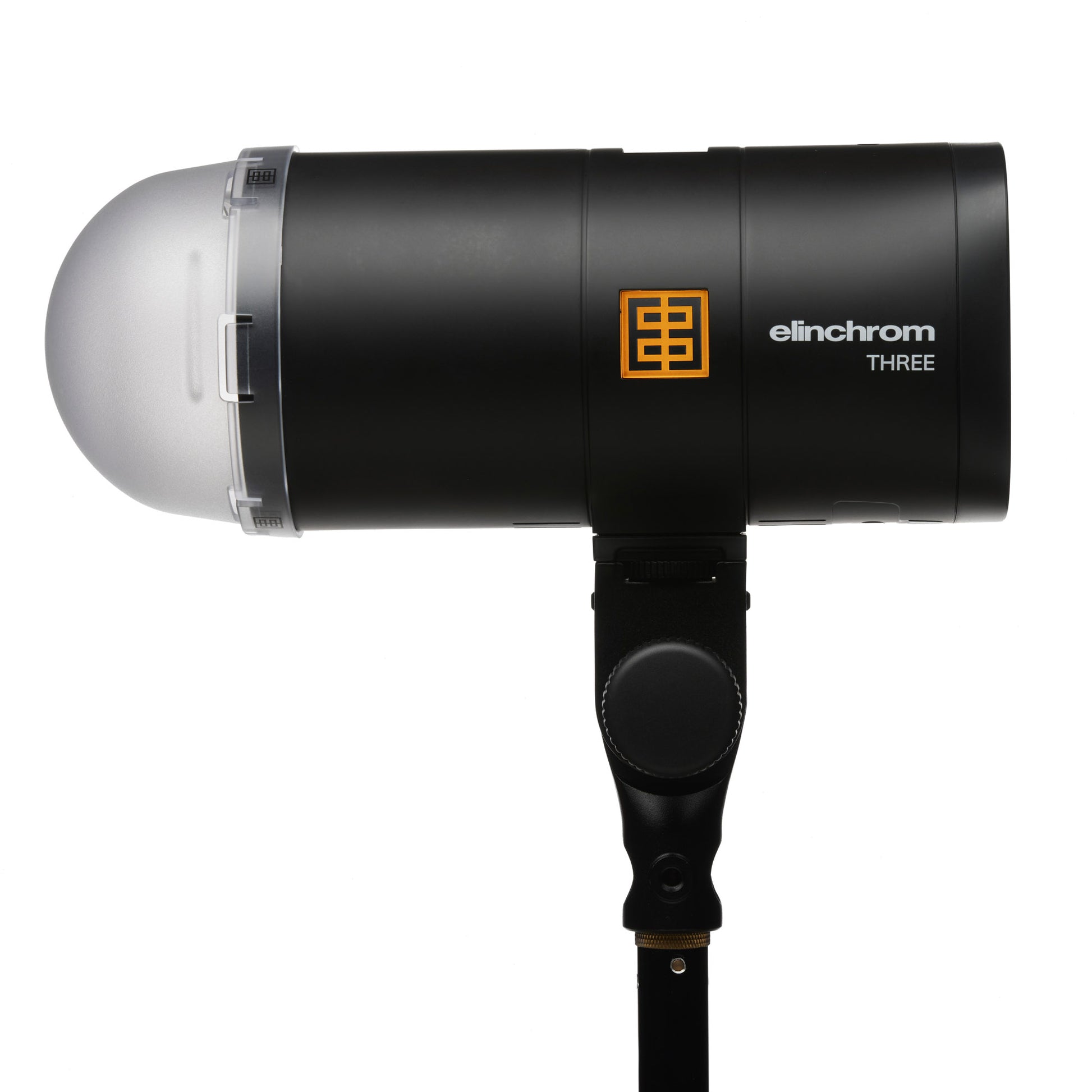 Close-up of Elinchrom THREE’s LED modeling light in a dark studio