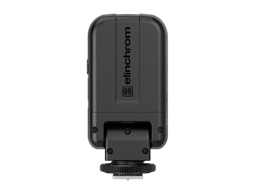 Photographer using the Skyport Plus to trigger an off-camera Elinchrom studio flash.