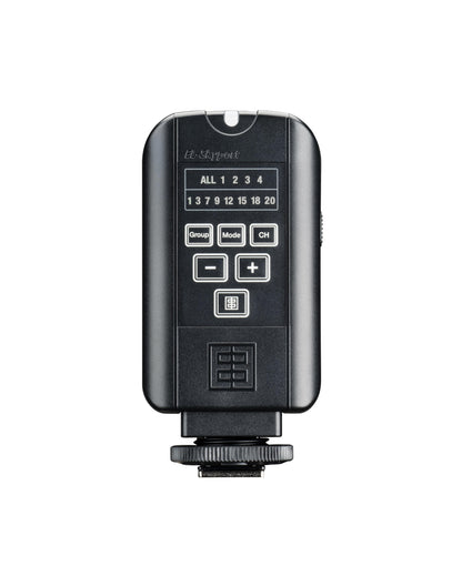 The Skyport Plus transmitter with two AA batteries installed in the compartment.