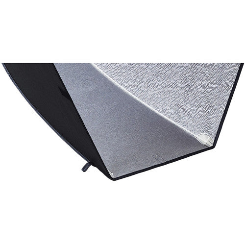 Close-up of a textured black and gray umbrella on a white background