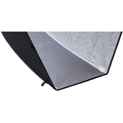 Close-up of a textured black and gray umbrella on a white background