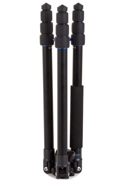 Compact Benro FGP28A tripod with reverse-folded legs for travel and storage.