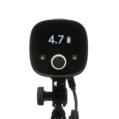 Photographer using Elinchrom THREE flash for perfect lighting setup