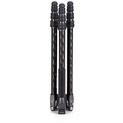 Portable carbon fiber tripod folded for outdoor landscape photography.