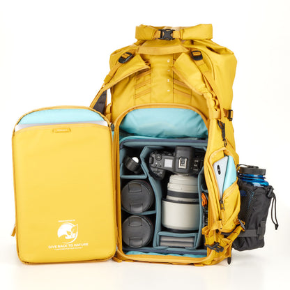 Action X50 Backpack with Core Unit v2, securely holding a DSLR camera and lenses.