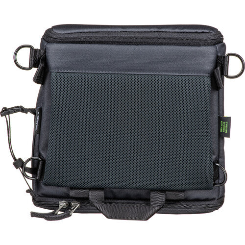 Shimoda Designs Top Loader worn as a front chest pack using accessory straps.