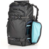 Backpack for photographers with zippered pockets for water bottles and phones.