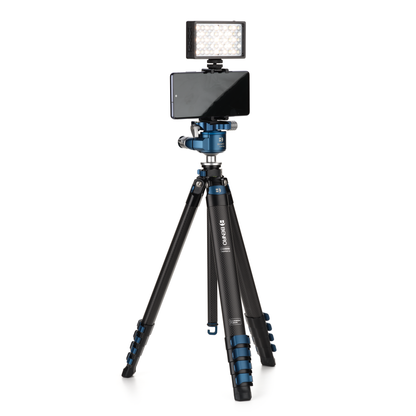 Benro Blackbird tripod legs showing a smart phone with a LED light siting over. 