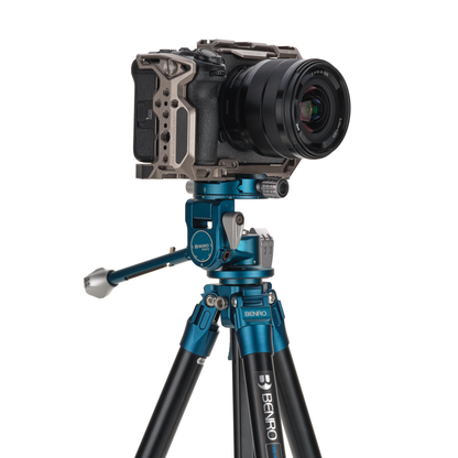 Tripod in standing, capturing a landscape photo with a mirrorless camera.