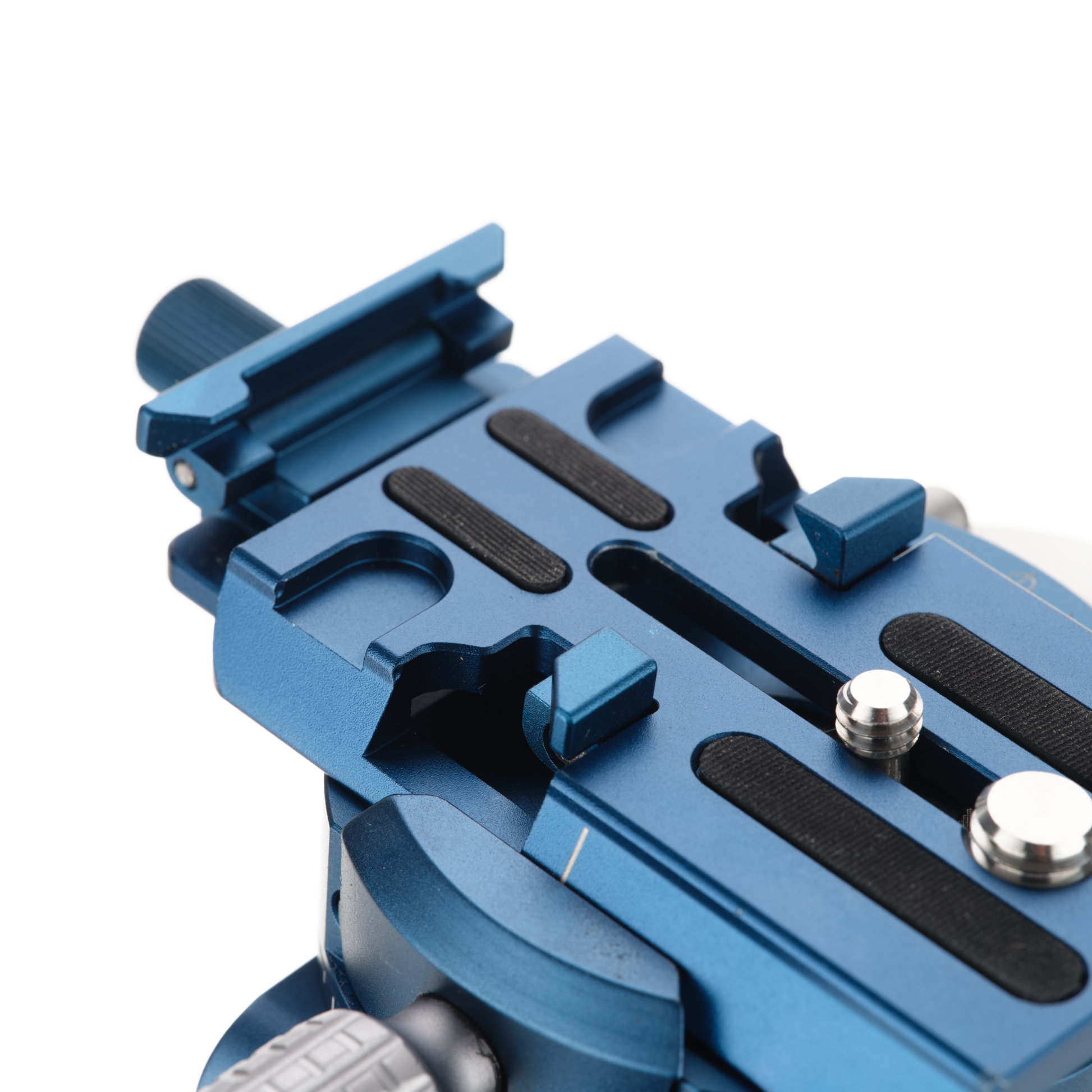 Quick-release plate with 1/4 and 3/8-inch camera mounting screws.