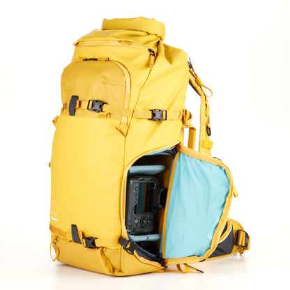 Action X50 Backpack with a water bottle in the removable side pouch for easy access.