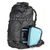 Shimoda Designs Action X50 V2 Starter Kit backpack with a 16" laptop inserted, highlighting laptop/tablet compatibility.