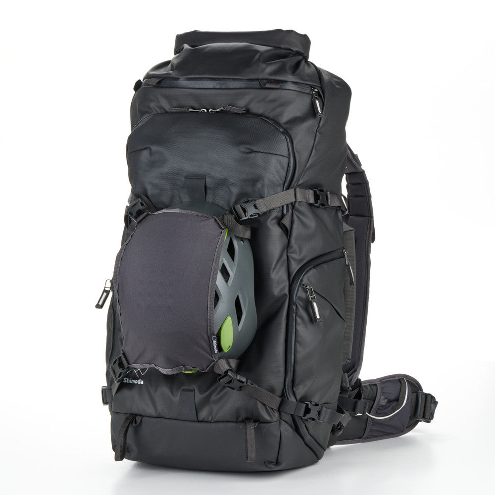 Action X50 Backpack Starter Kit, including the backpack, Core Unit v2, helmet holder, and rain cover.
