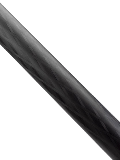 Macro detail highlighting the 9-layer carbon fiber weave of a tripod leg.